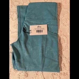 Zyia Active Aqua Paradise Pocket Light n Tight Hi-Rise Capri 20”(6-8)